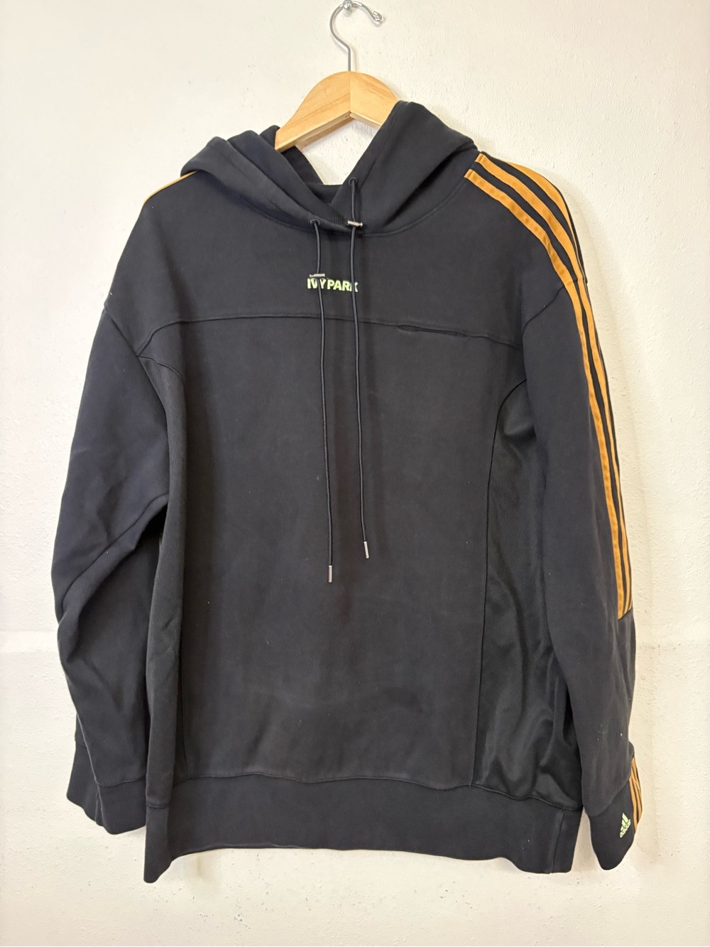IVY PARK x adidas Unisex Black Hoodie with Gold Stripe Accent